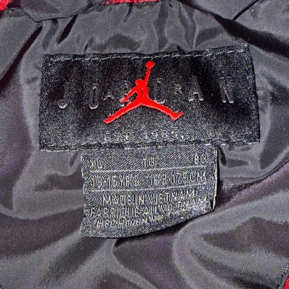 Jordan Black and Red Hooded Vest with White Sleeves